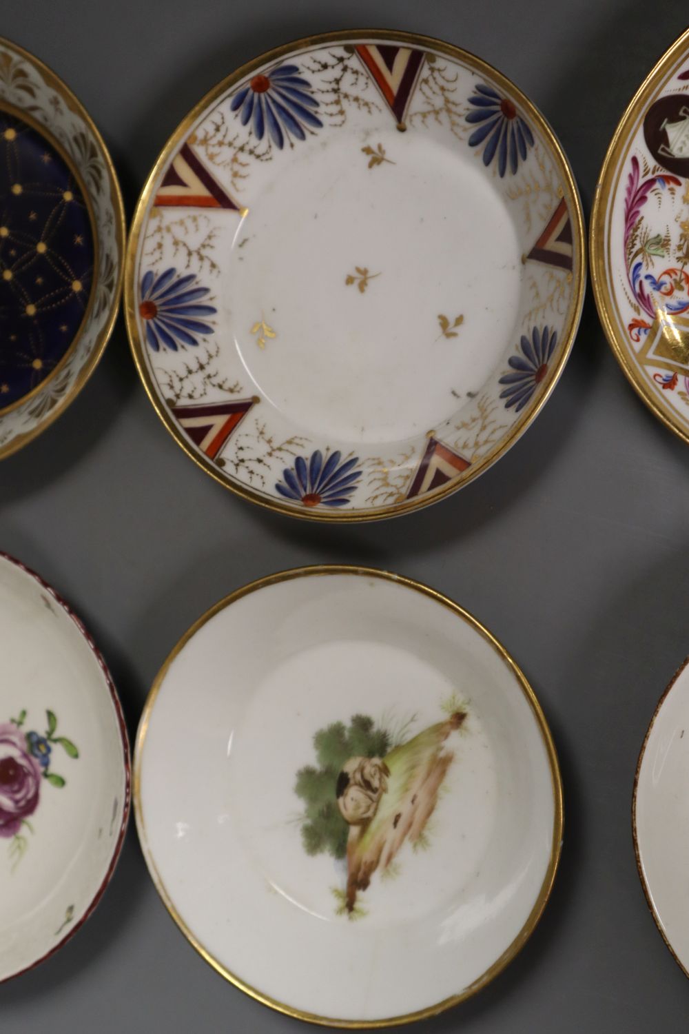 An 18th century Ludwigsburg moulded saucer painted with a large rose and four others